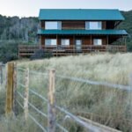 Offgrid Cabin with fence in front