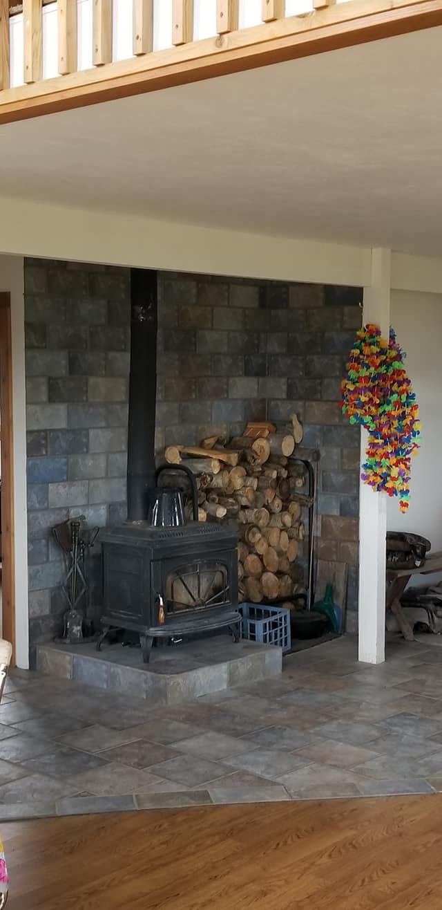 Cabin Fireplace with Stacked Wood