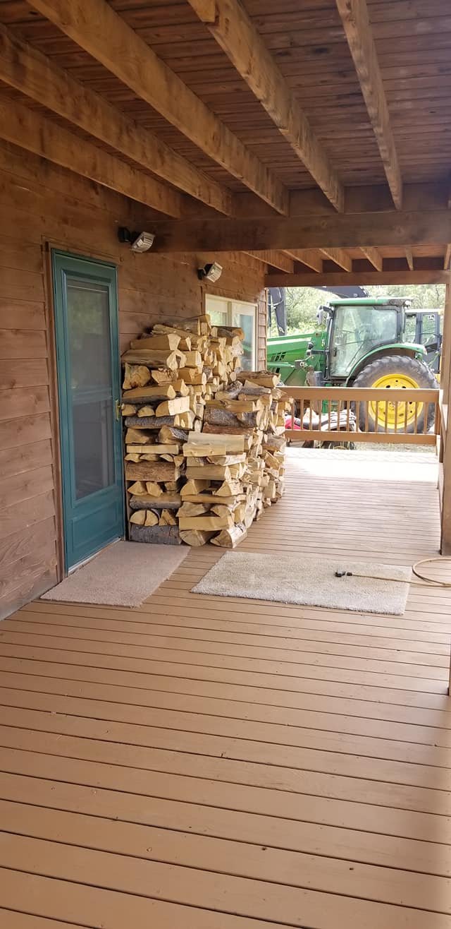 Cabin Deck with woodpile